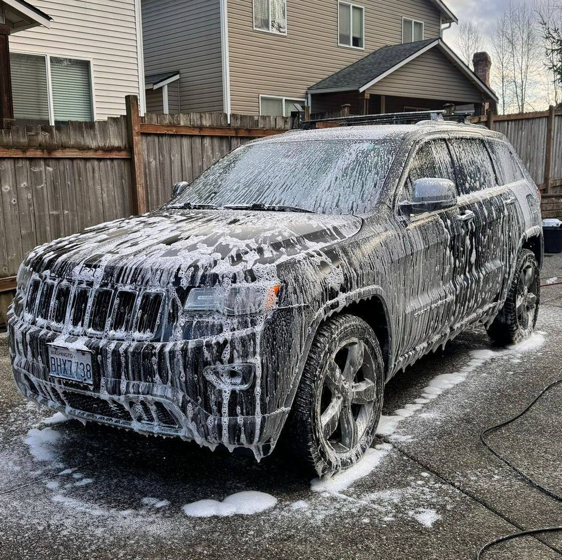 Jeep Grand Cherokee covered in snow foam