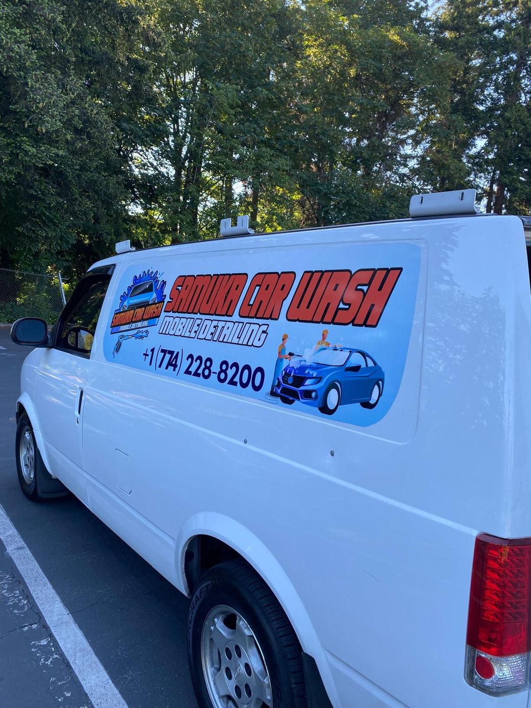 White Samuka Car Wash work van